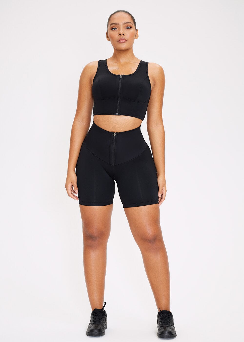 Short de sport à fermeture éclair